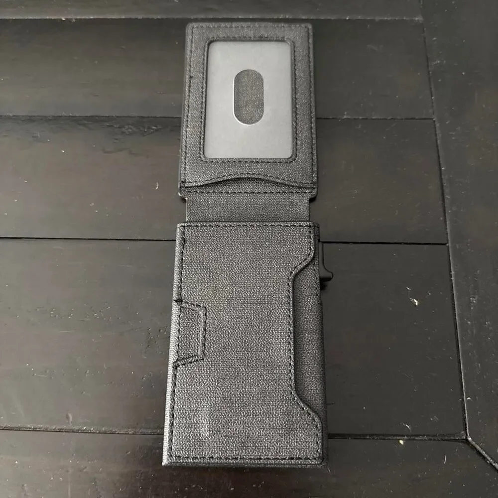 Black leather wallet with textured surface